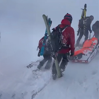 Mountain Rescue Team with Oliver on Stretcher
